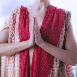 intimacy-photo-square woman's torso in Namaste pose